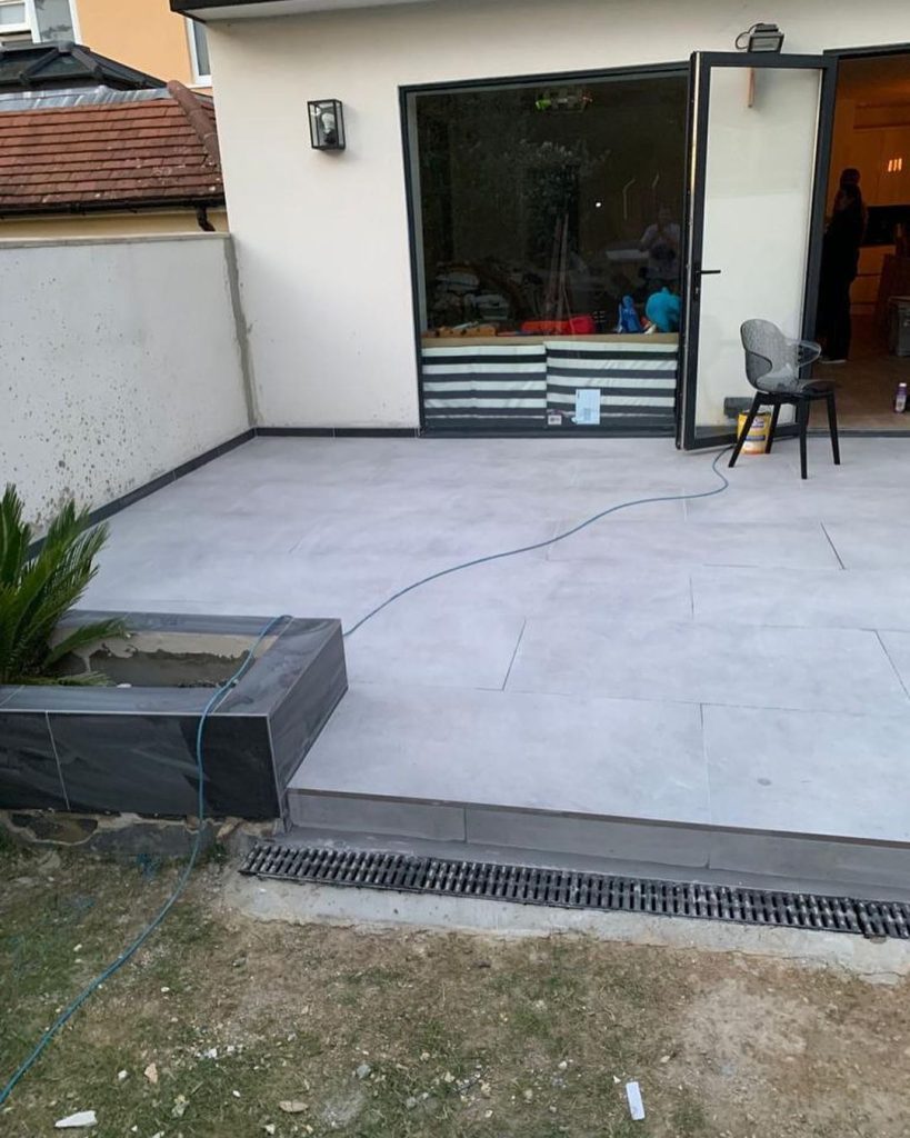 Balcony repairs and back of the house tiling